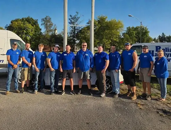 a group photo of the Reliable Handyman team